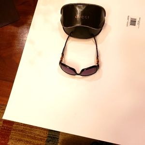 Gucci female sunglasses with case in good condition.